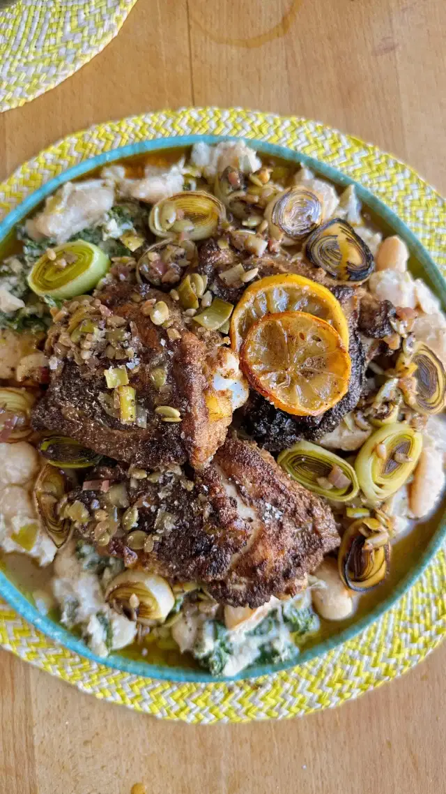 Do I cook meat? Yes, course I do! While my feed often highlights seasonal vegetables—since my cooking is produce-driven—I approach meat with the same thoughtfulness and care. 

I am loving @herbamareuk seasoning and it makes such a good chicken marinade. Recipe is below…. 

My meat dishes always feature the best spices and ingredients, with vibrant seasonal vegetables taking center stage to enhance the flavors. This chicken butterbean and leek dish, created for a recent event, showcases the natural creaminess of the butterbeans, elevated by the homemade sunflower seed paste, blanched kale and leek vinagrette, making it such an indulgent yet healthy number. 

Chicken Marinade
Ingredients:

12 chicken thighs
2 tbsp paprika
1 tbsp cumin
1 tbsp ground coriander
½ tsp cayenne pepper
1 tbsp garlic granules
1 tbsp @herbamareuk Spicy Sea salt 
Instructions:

- In a small bowl, combine paprika, cumin, ground coriander, cayenne pepper, garlic granules and spicy sea salt. 
- Coat the chicken thighs evenly with the spice mix. Make sure each piece is well covered.
- Let the chicken marinate in the fridge for at least 30 minutes, or up to 24 hours for a deeper flavor.
- Fry the chicken, skin side down and the roast in a 190C oven for 15 minutes until cooked through. 

Also loving @boldbeanco butter beans!

#chicken #chickenthigh #meatmarinade #marinade #chickendish #springrecipe